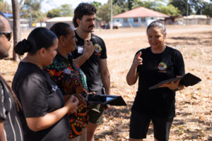 Mikaela and Lindsay from Indigital talking through the Lidar Scanning program with Aunty Melanie, Tanaya, and Tully during the Aurukun Masterclass