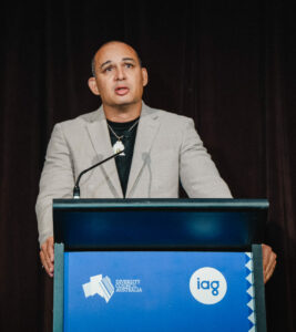 Thomas Mayo speaking to the audience at the 2024 Diversity Debate